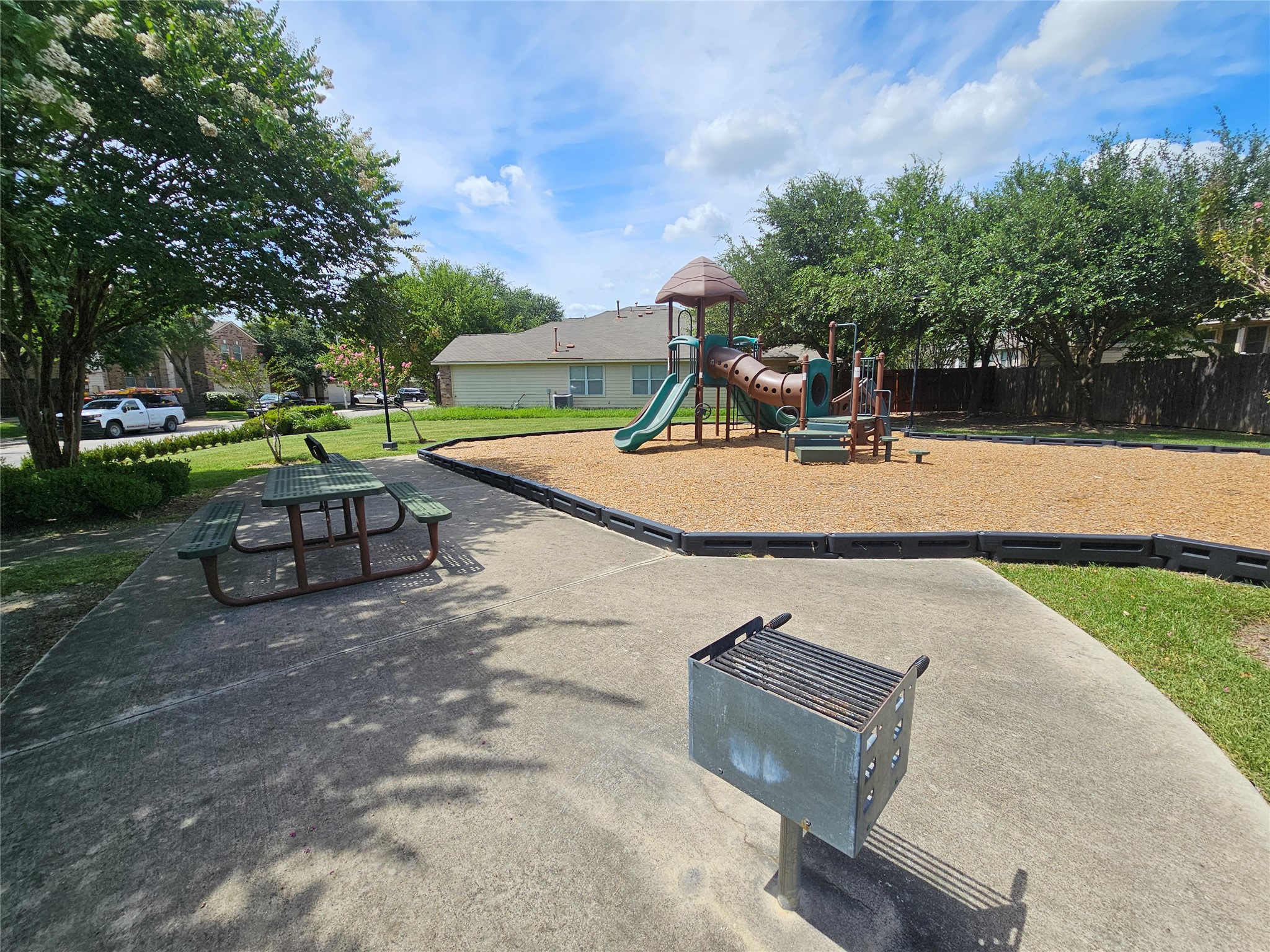 2035 Intrepid Drive Buda, TX 78610 - Photo 25 of 26 A well-maintained community space offers a recreational playground and convenient picnic area.
