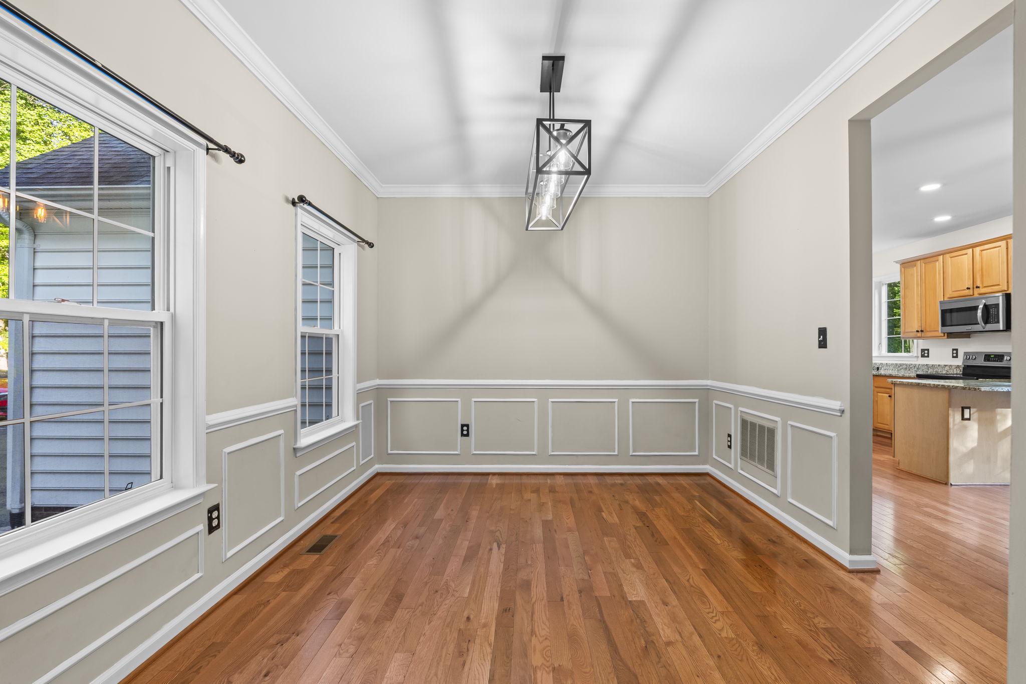 210 Walnut Creek Road Huntingtown, MD 20639 - Photo 8 of 47 Large dining space with updated light fixture