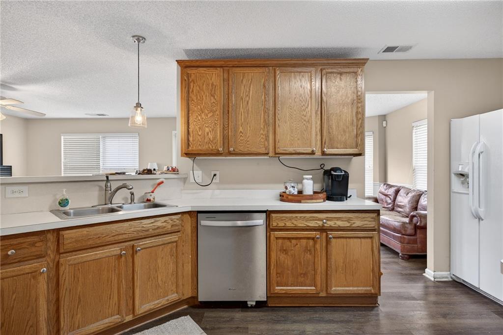9 Darbys Run Way Hiram, GA 30141 - Photo 14 of 33 a kitchen with a sink stove and cabinets