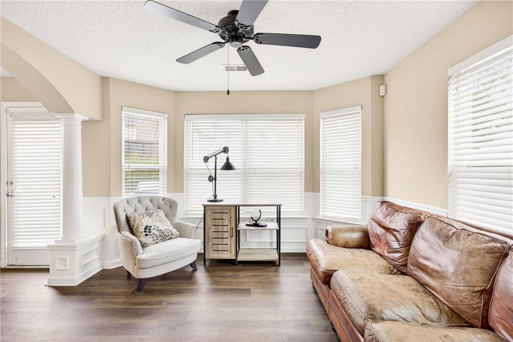 9 Darbys Run Way Hiram, GA 30141 - Photo 10 of 33 a living room with furniture and a large window