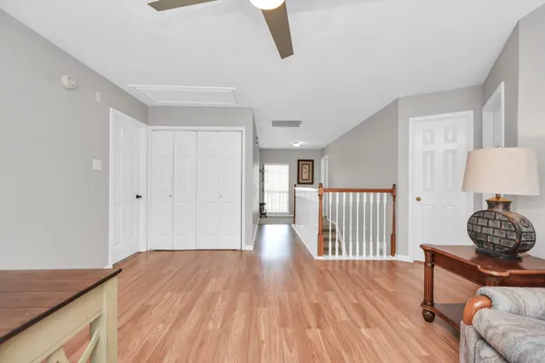 a view of a hallway with washer and dryer