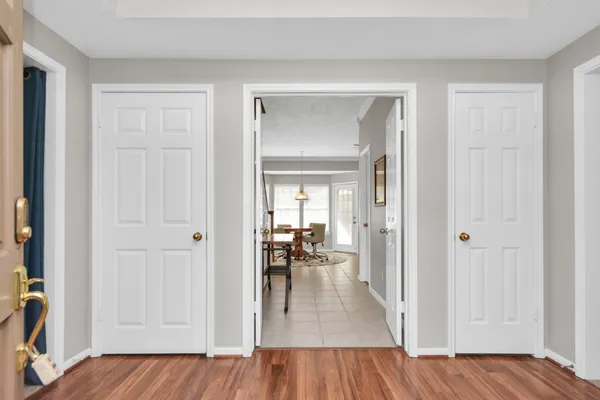 a view of a bedroom from a hallway