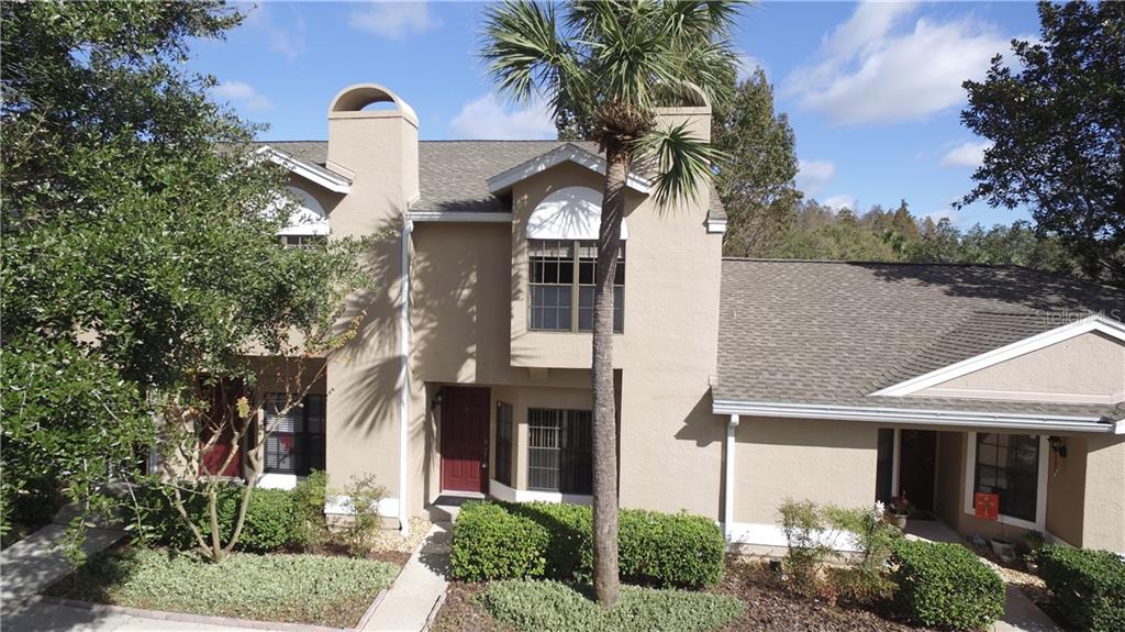 5100 Burchette Road, Unit 3604 Tampa, FL 33647 - Photo 1 of 1 a front view of a house with a garden
