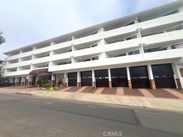 a view of a building with a street