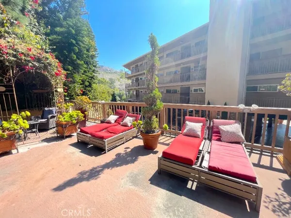 a building outdoor space with patio furniture