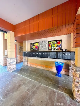 a view of a swimming pool with an outdoor seating and a yard