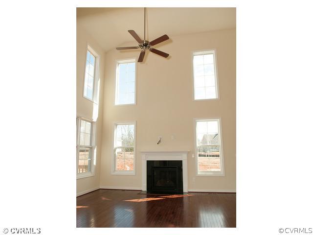 1318 Coalfield Road Midlothian, VA 23114 - Photo 3 of 10 a view of a livingroom with furniture window and fireplace