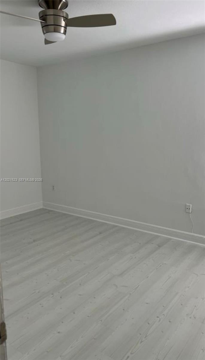 9159 Southwest 77th Avenue, Unit 101 Miami, FL 33156 - Photo 7 of 12 a view of a room with a sink