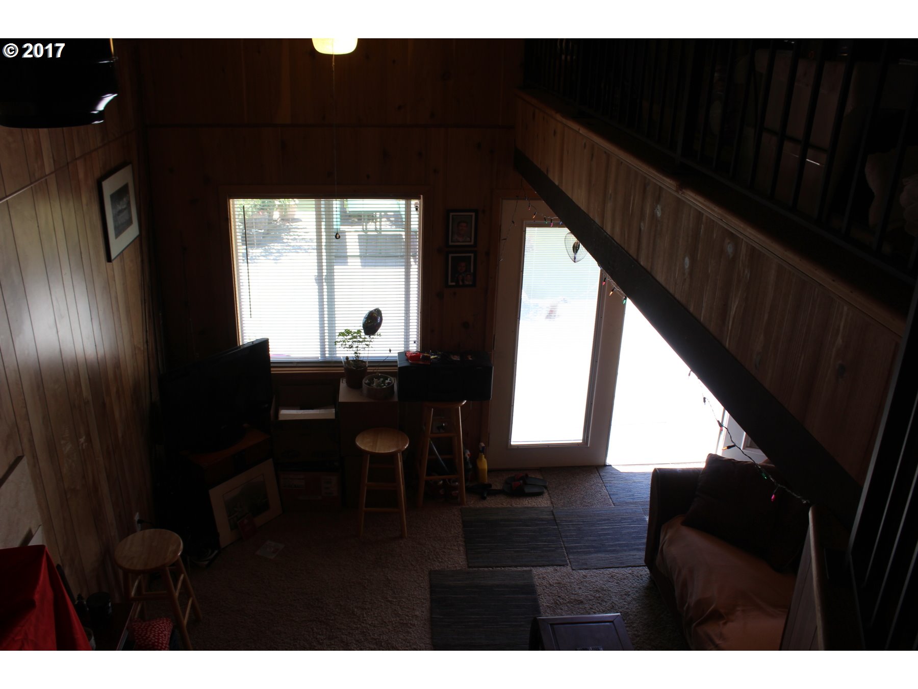 14456 Northwest Larson Road Portland, OR 97231 - Photo 13 of 21 a living room with furniture and a window