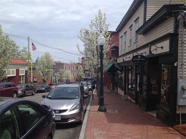 14 Friend Street Amesbury, MA 01913 - Photo 11 of 12 a outdoor space with lots of cars parked on the road