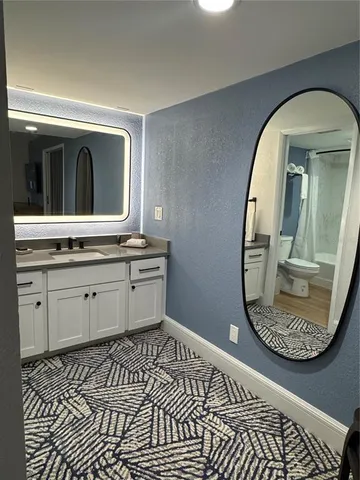 a view of a livingroom with wooden floor