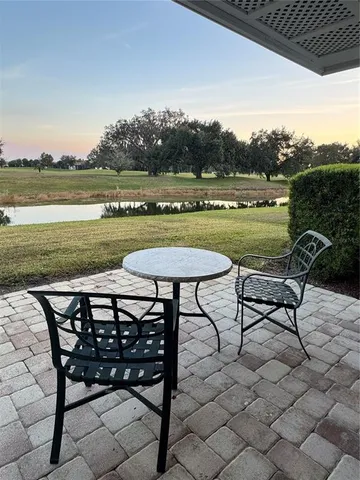 a view of a chairs and table on the terrace