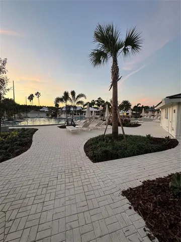 a view of a swimming pool and lake