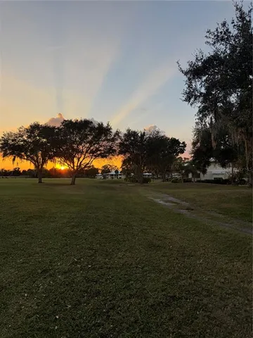 a view of an ocean and yard