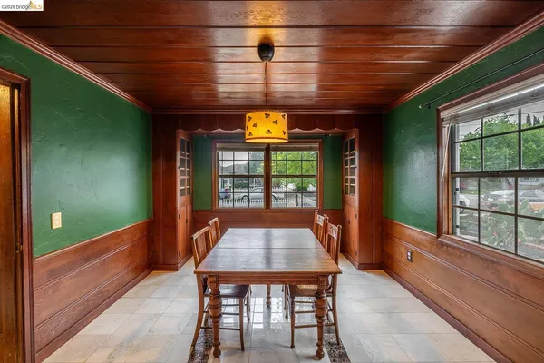 a view of a porch with furniture and window