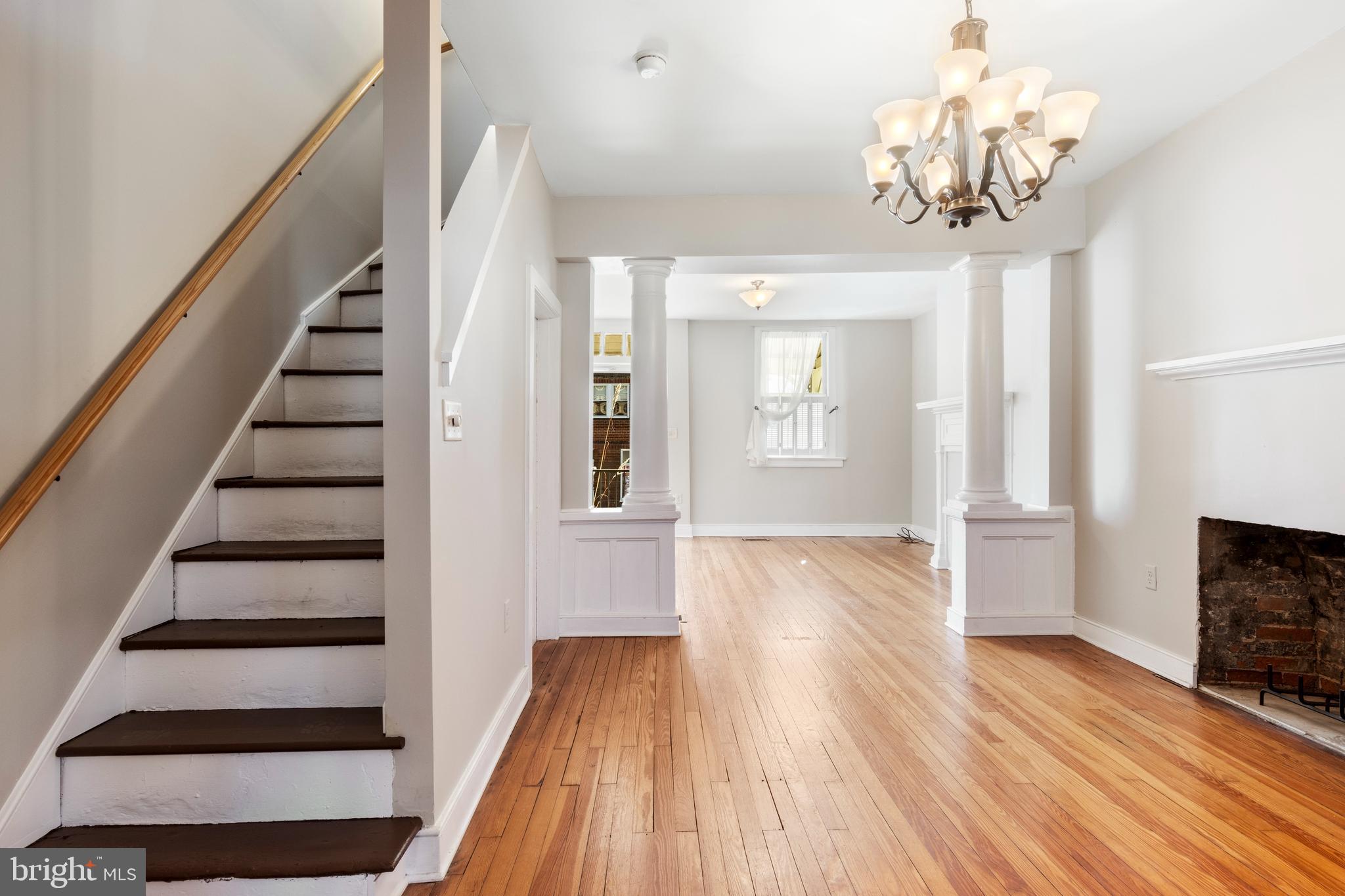 311 State Street Kennett Square, PA 19348 - Photo 13 of 37 a view of entryway with wooden floor and stair