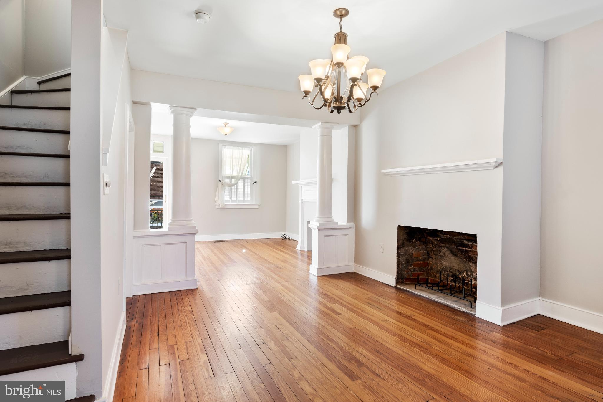 311 State Street Kennett Square, PA 19348 - Photo 14 of 37 a view of a room with wooden floor and fireplace