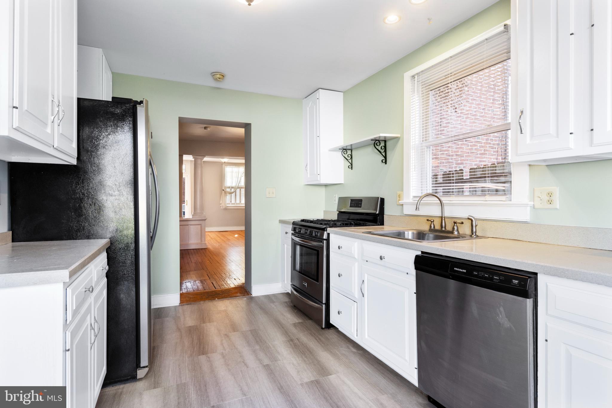 311 State Street Kennett Square, PA 19348 - Photo 19 of 37 a kitchen with a sink stove and refrigerator