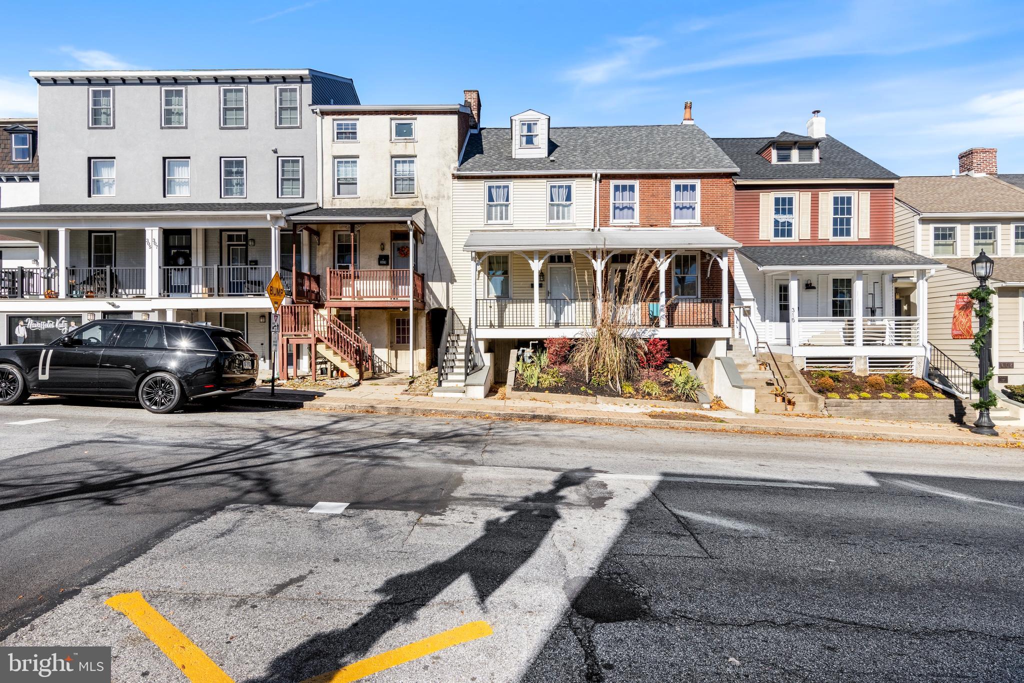 311 State Street Kennett Square, PA 19348 - Photo 2 of 37 a front view of a building with car parked