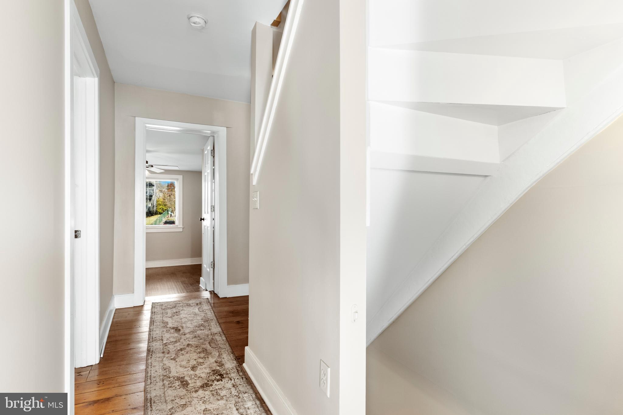 311 State Street Kennett Square, PA 19348 - Photo 22 of 37 a view of hallway with wooden floor