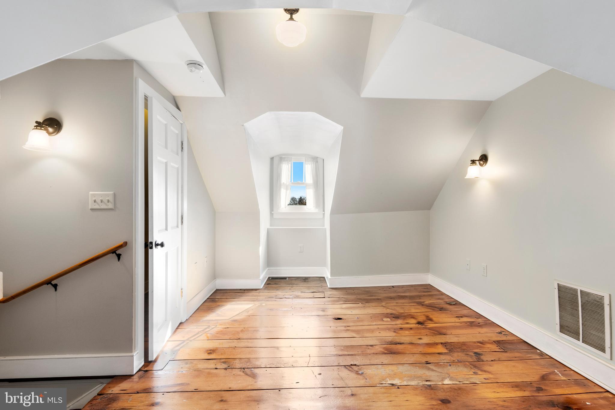 311 State Street Kennett Square, PA 19348 - Photo 32 of 37 wooden floor in an empty room with a window