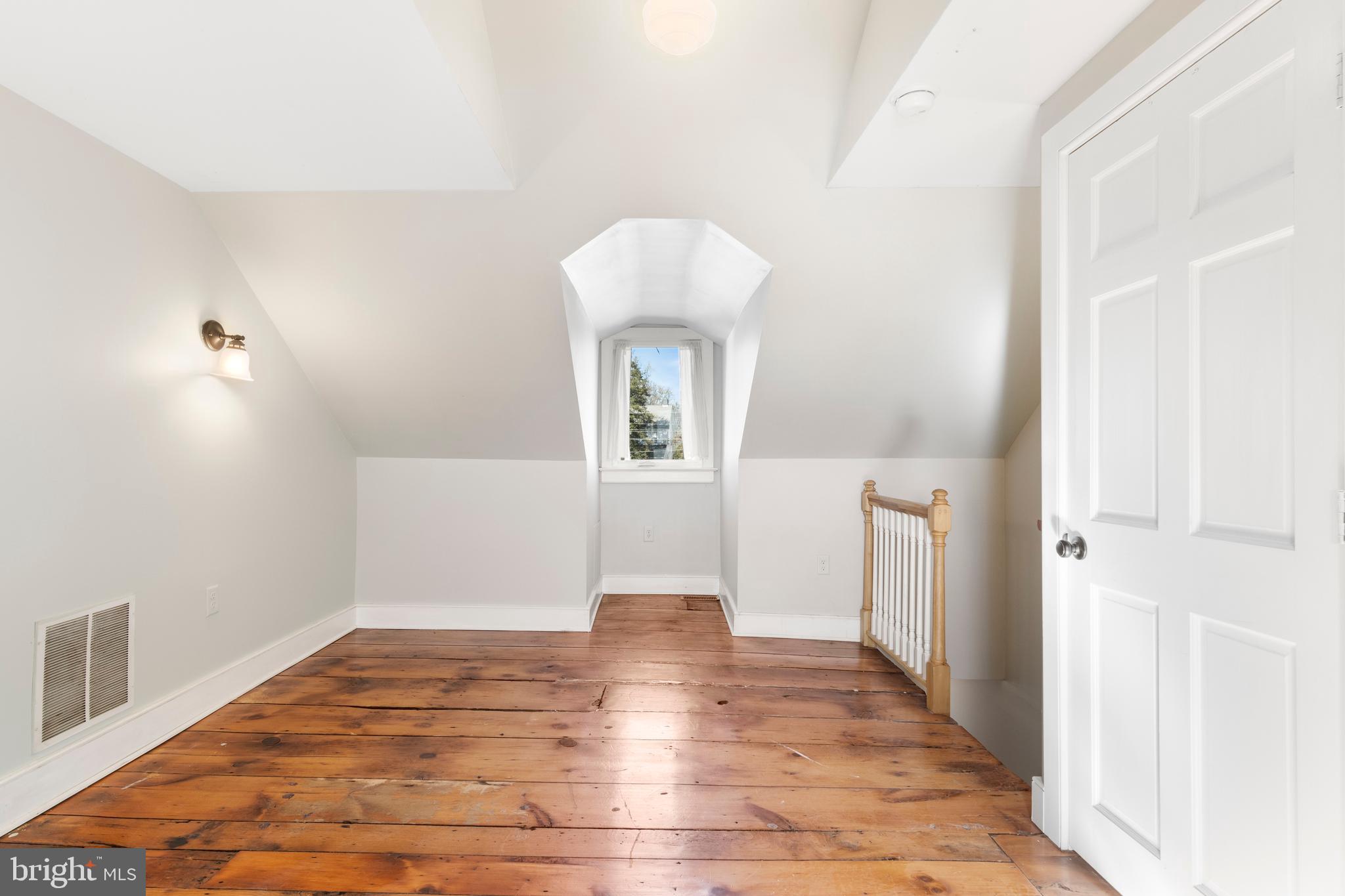 311 State Street Kennett Square, PA 19348 - Photo 33 of 37 a view of an empty room and wooden floor