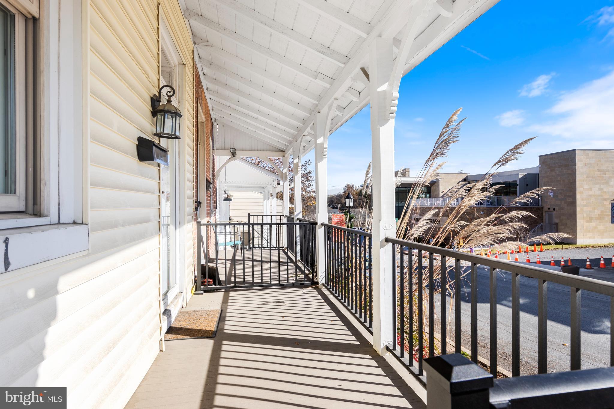 311 State Street Kennett Square, PA 19348 - Photo 4 of 37 a view of a balcony with wooden floor