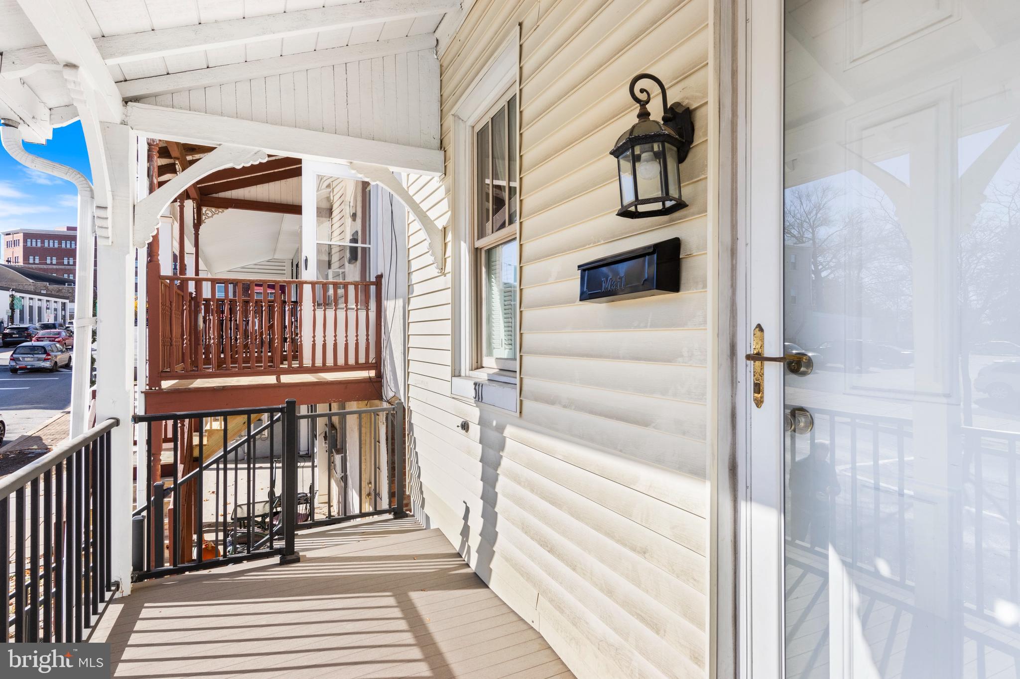 311 State Street Kennett Square, PA 19348 - Photo 5 of 37 a view of a house with a door and wooden floor