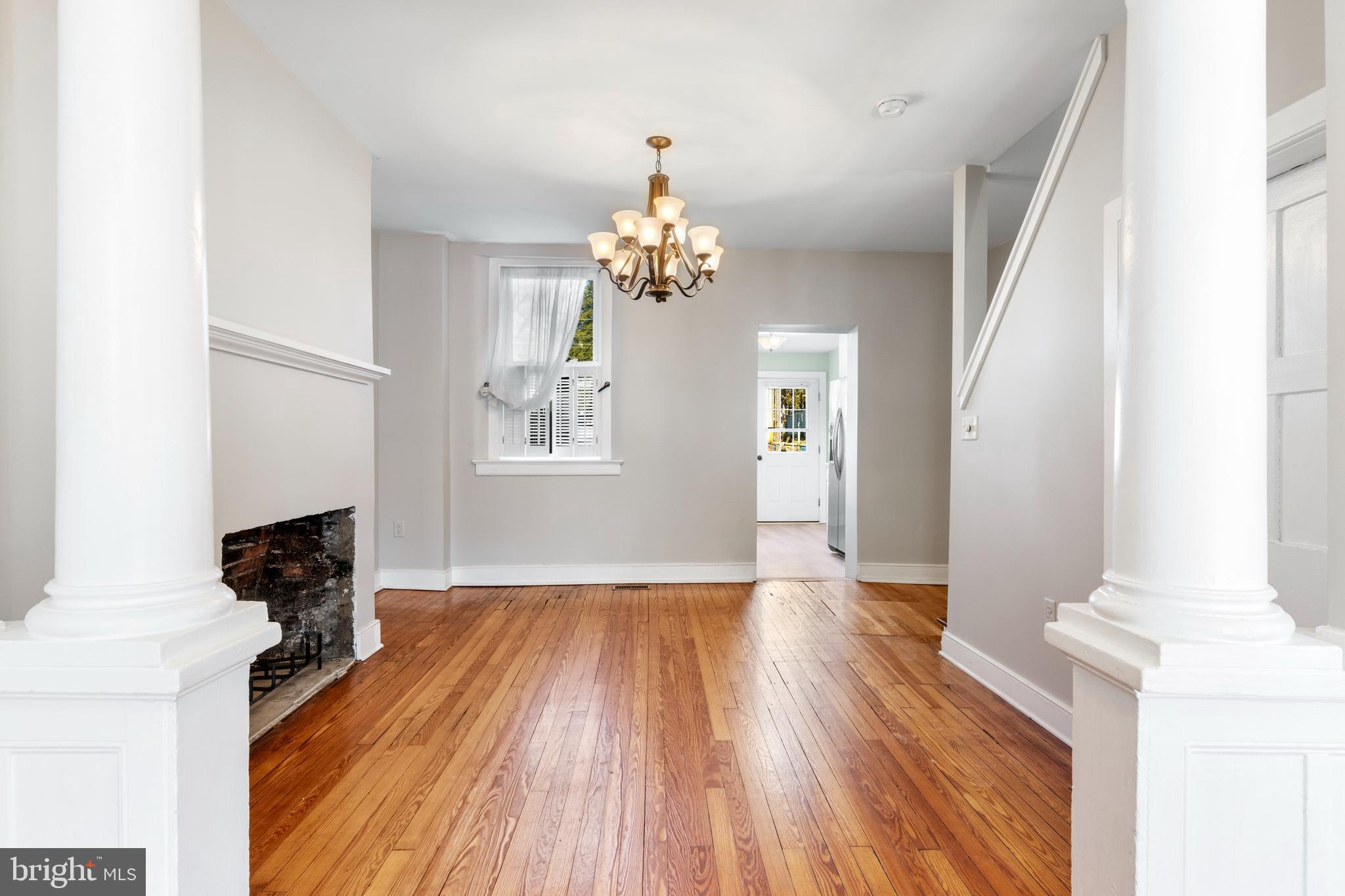 311 State Street Kennett Square, PA 19348 - Photo 10 of 37 a view of an empty room with wooden floor and a window