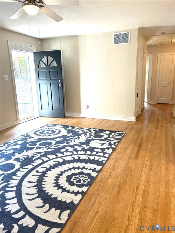 1042 Peck Road Richmond, VA 23235 - Photo 14 of 29 Living room with light wood-style floors and a cei