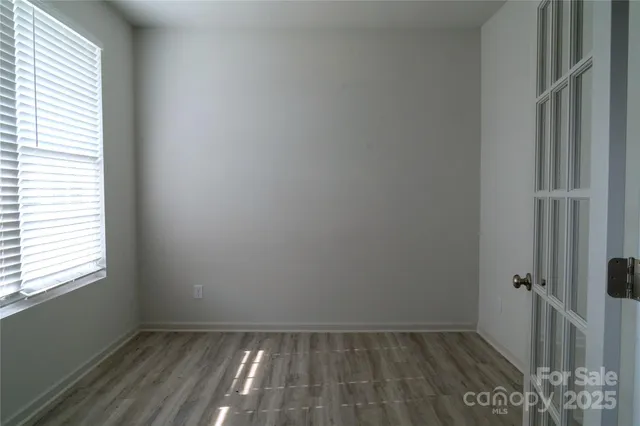 a view of an empty room and window