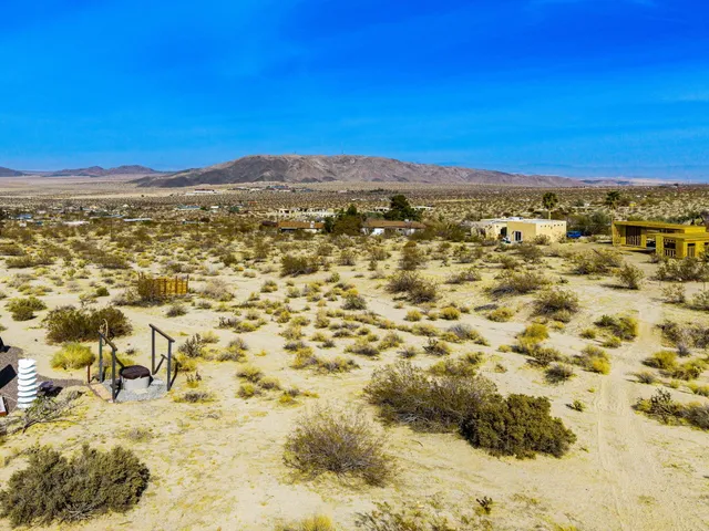 a view of city with ocean