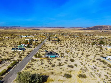 a view of city with ocean