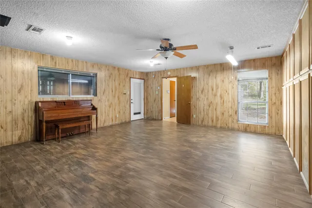 a spacious bathroom with a double vanity sink mirror and double