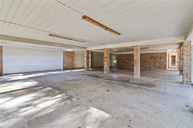 a view of a park with large trees