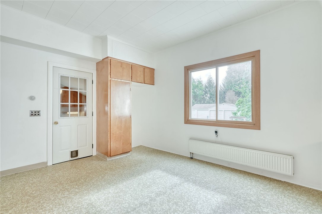 644 Parma Center Road Parma, NY 14468 - Photo 11 of 49 KITCHEN - DOOR TO MUDROOM, BASEMENT STAIRS, & 2-CAR GARAGE