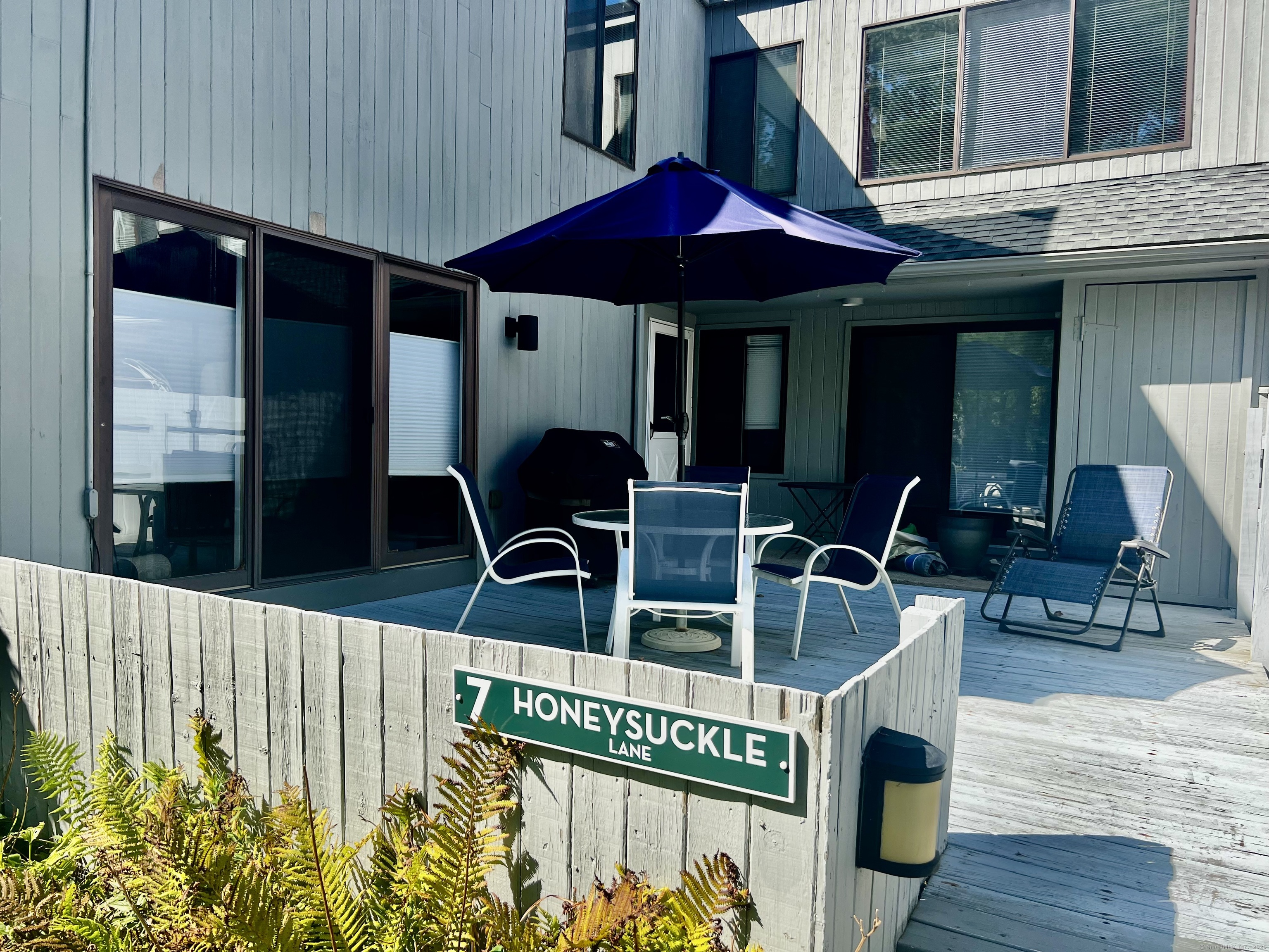 7 Honeysuckle Lane, Unit 7 Ridgefield, CT 06877 - Photo 2 of 22 One of the Largest Decks in Fox Hill