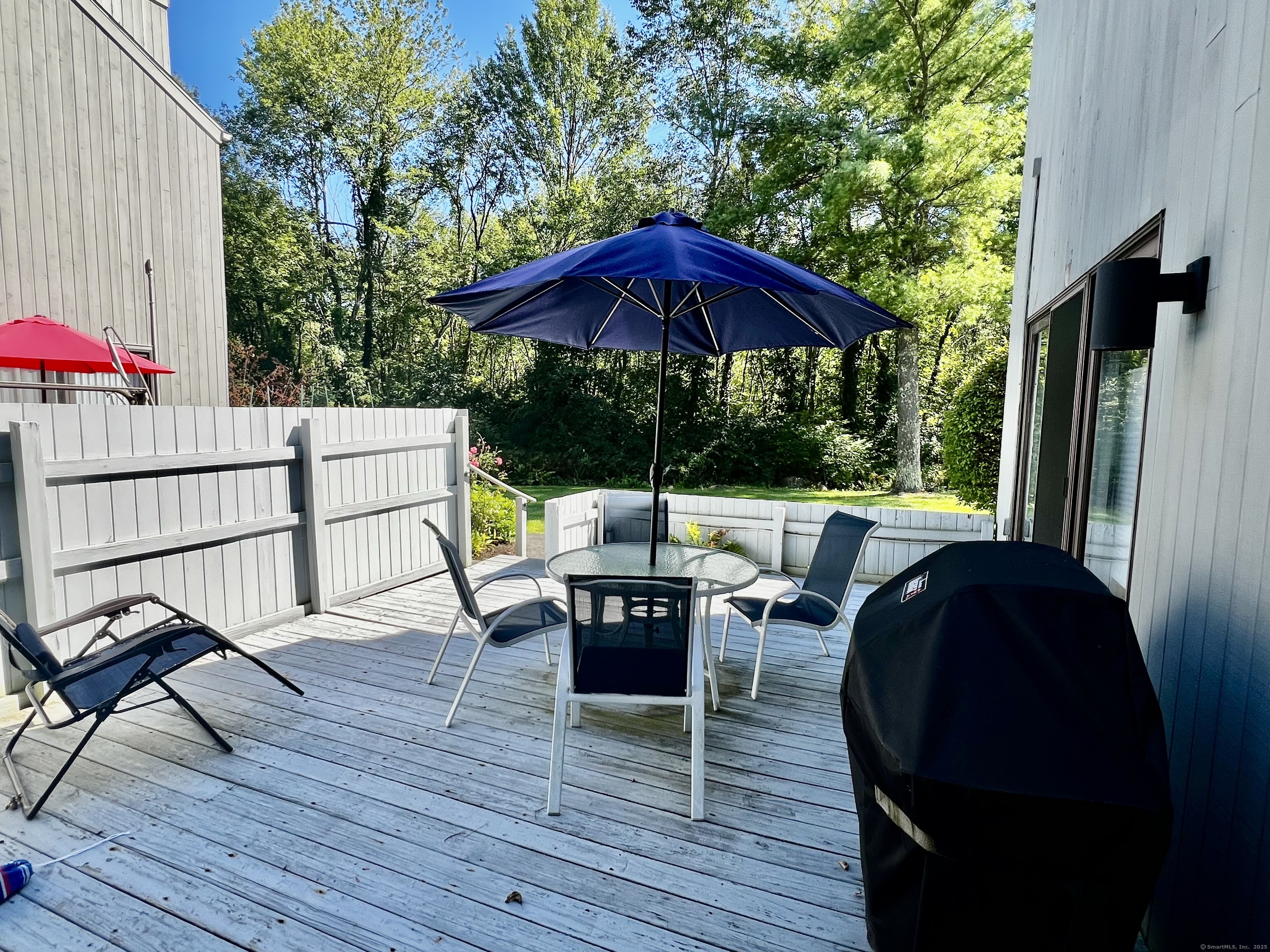 7 Honeysuckle Lane, Unit 7 Ridgefield, CT 06877 - Photo 3 of 22 Access the Deck from either the Living Room or Master Bedroom