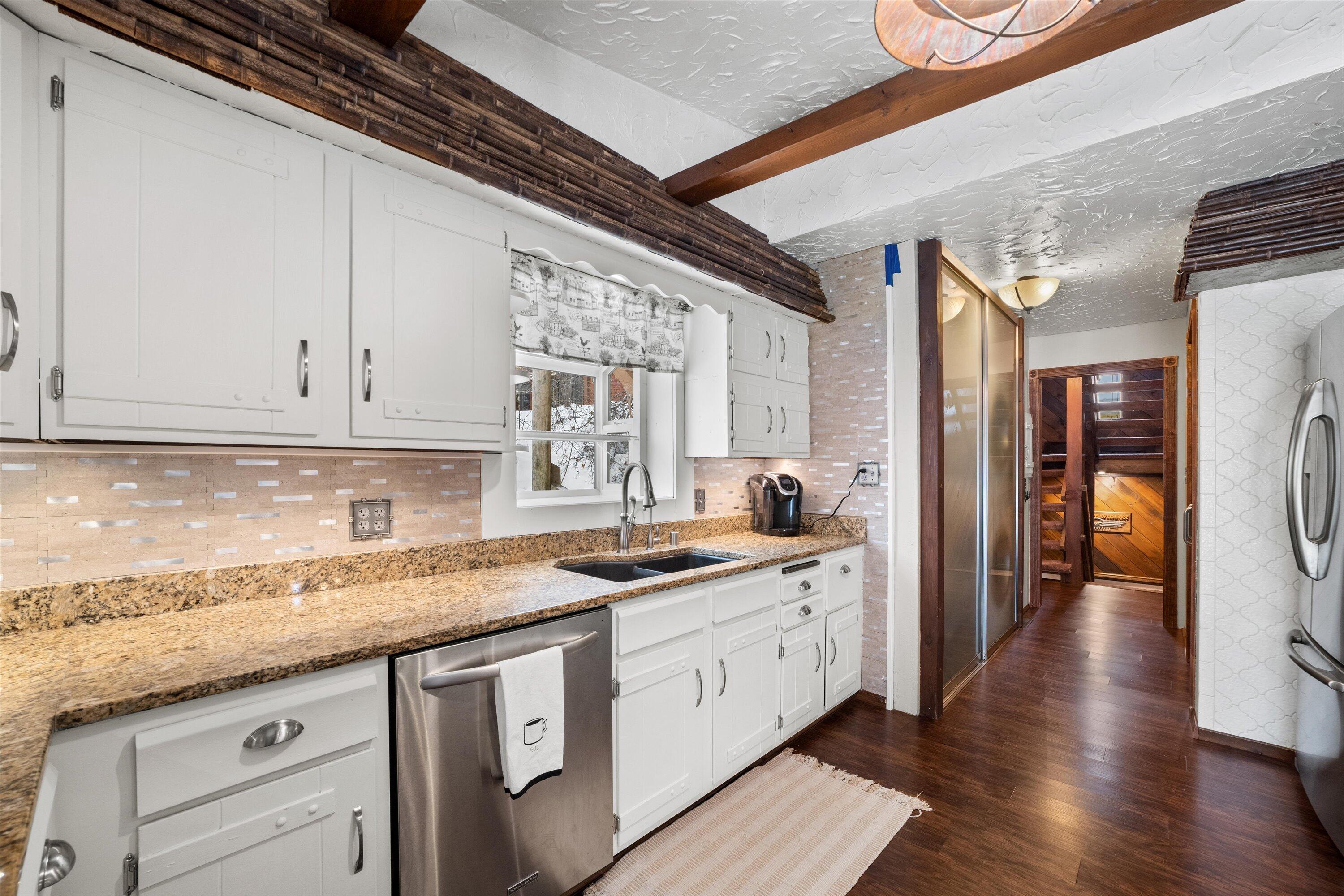 S108W34703 Jacks Bay Road Mukwonago, WI 53149 - Photo 16 of 74 Kitchen Access to Pantry and Laundry