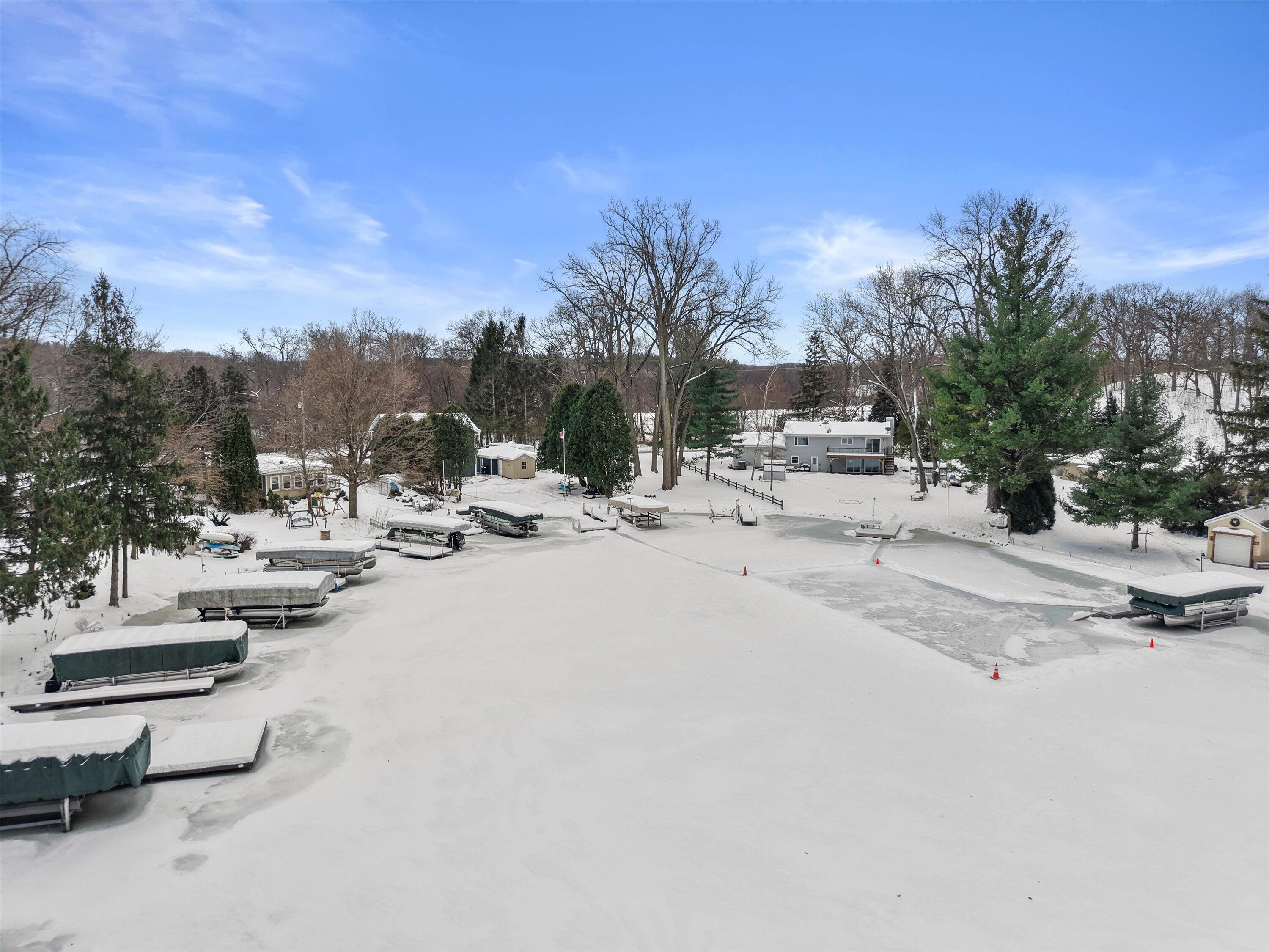 S108W34703 Jacks Bay Road Mukwonago, WI 53149 - Photo 4 of 74 Pier View into the Bay