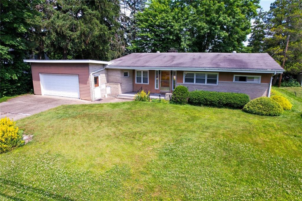 116 Germaine Road Butler, PA 16001 - Photo 1 of 43 a front view of a house with garden
