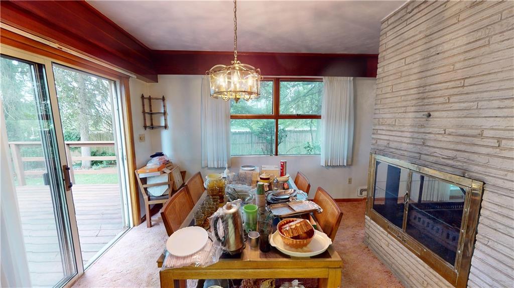 116 Germaine Road Butler, PA 16001 - Photo 11 of 43 a view of a dining room with furniture wooden floor and chandelier
