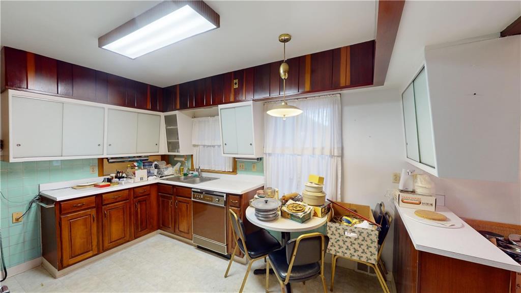 116 Germaine Road Butler, PA 16001 - Photo 13 of 43 a kitchen that has a sink and cabinets