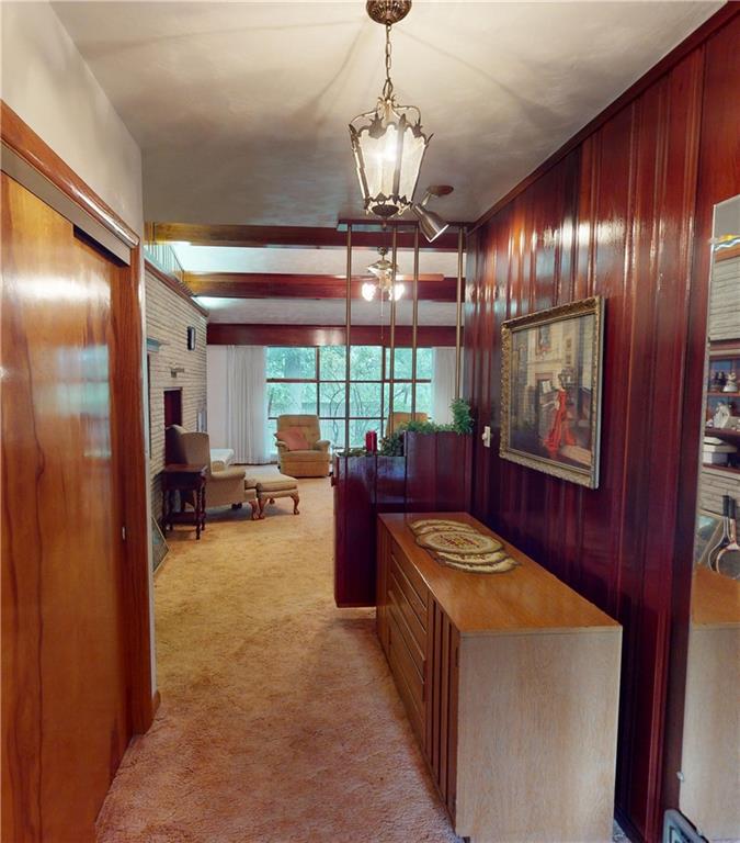 116 Germaine Road Butler, PA 16001 - Photo 4 of 43 a view of a hallway with furniture and chandelier