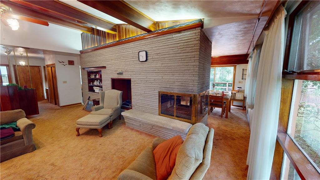 116 Germaine Road Butler, PA 16001 - Photo 7 of 43 a living room with furniture fireplace and a fireplace