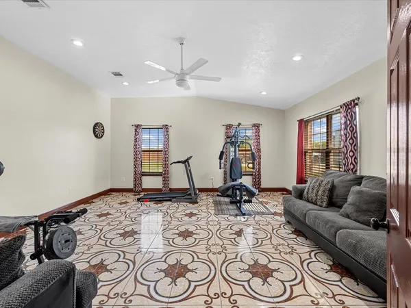 a view of a livingroom with a kitchen