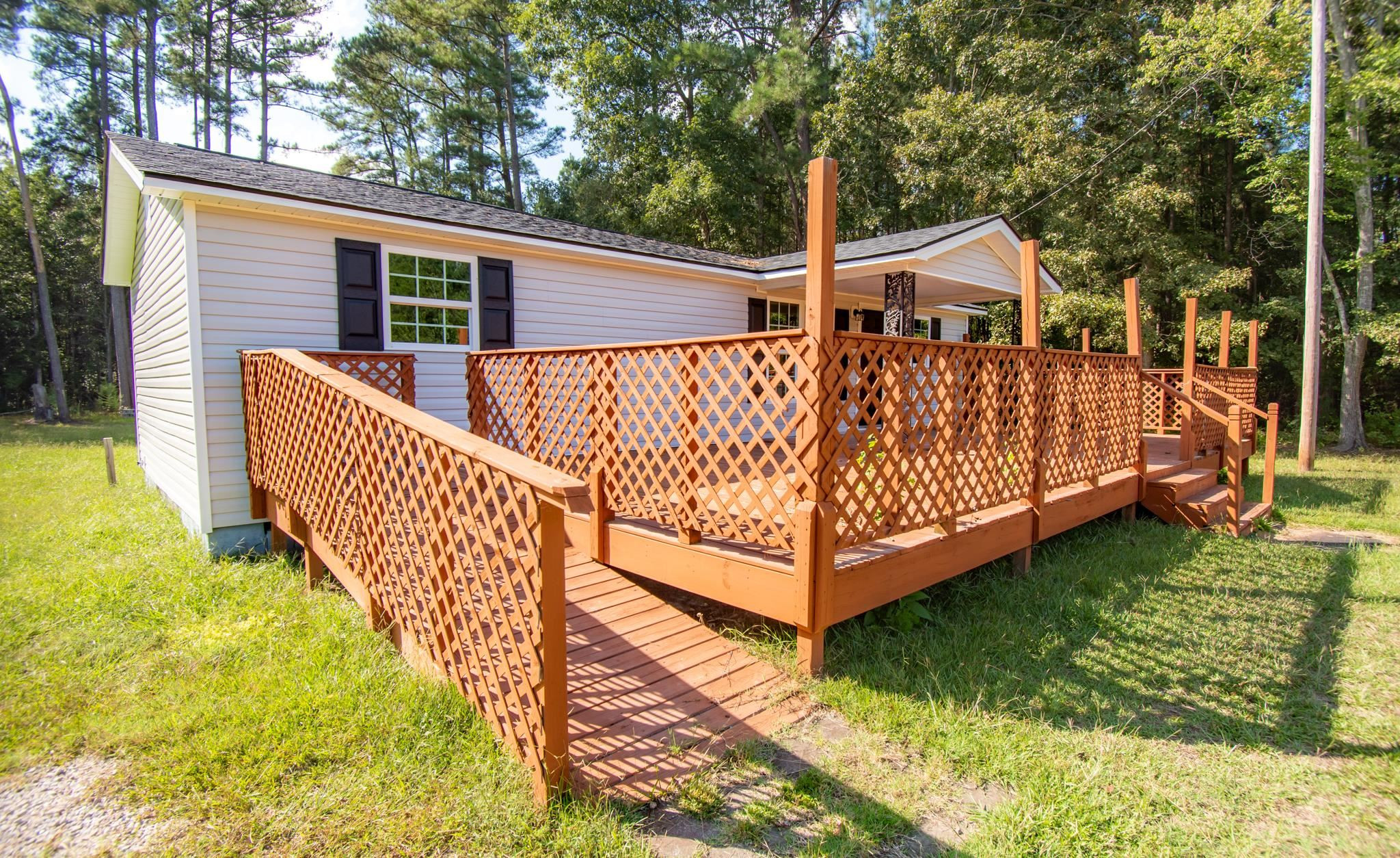 560 Covington Road Bunnlevel, NC 28323 - Photo 15 of 19 a front view of a house with garden