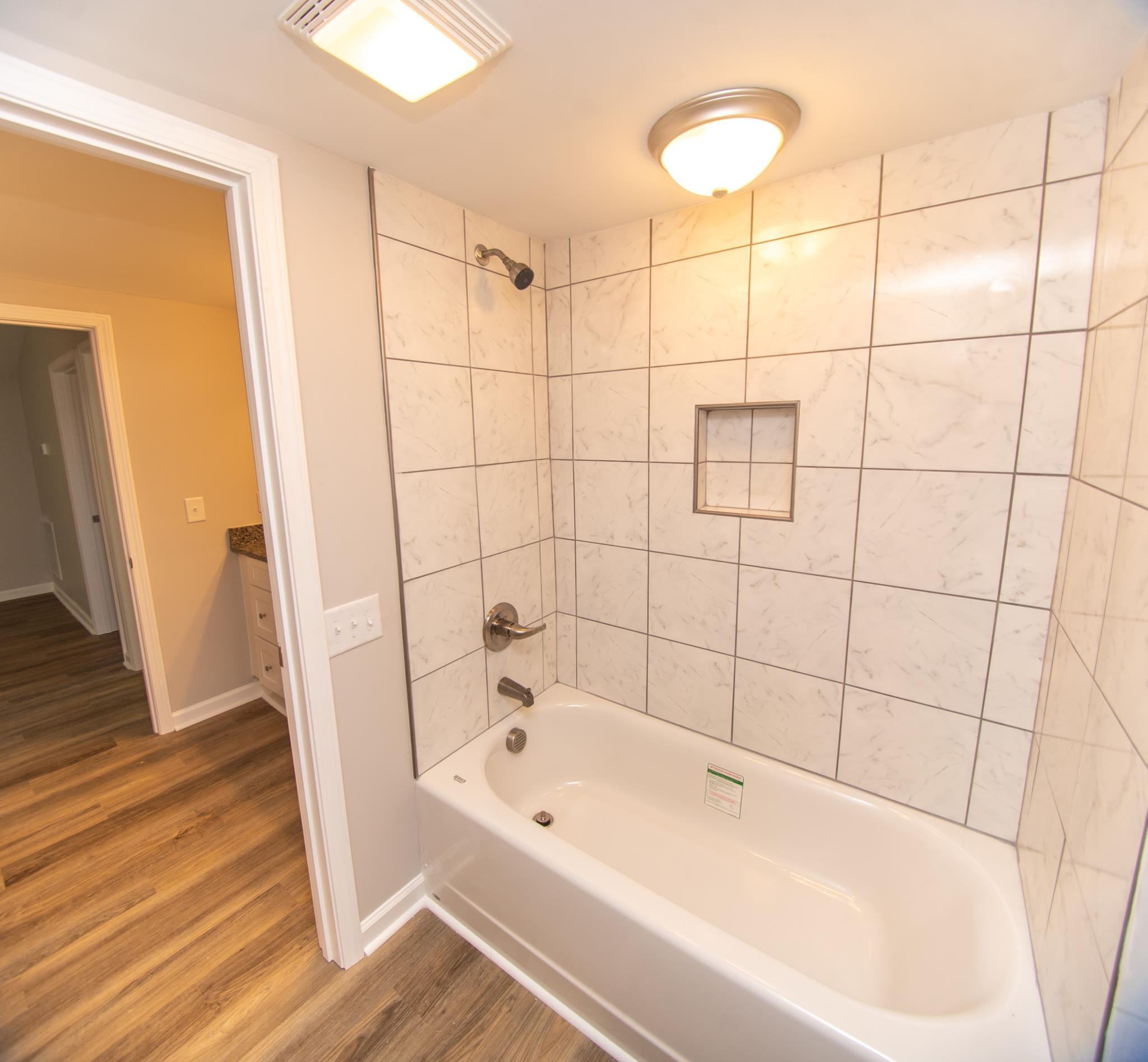 560 Covington Road Bunnlevel, NC 28323 - Photo 9 of 19 a bathroom with a bathtub and a shower