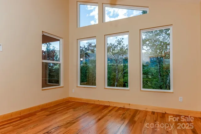 a bathroom with a sink mirror and toilet