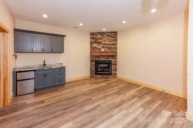 a view of a sink and cabinets